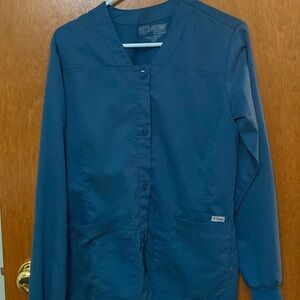 Carribean blue scrub top with buttons size medium